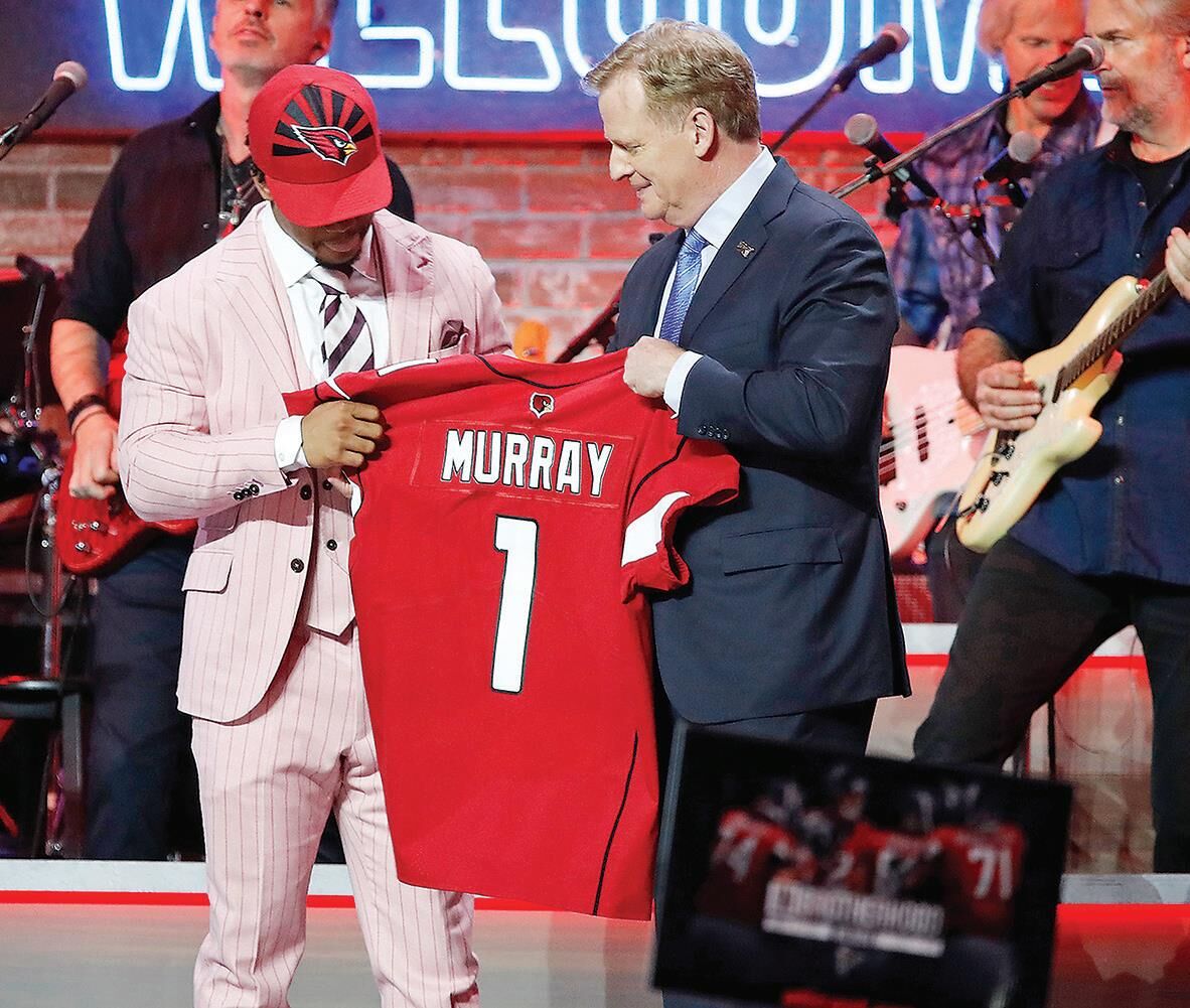 NFL commissioner Roger Goodell, middle, with Kyler Murray
